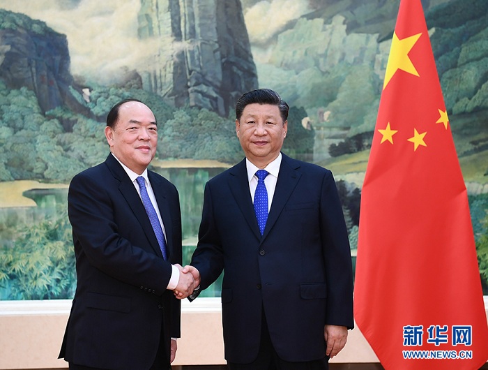 　9月11日，国家主席习近平在人民大会堂会见新当选并获中央政府任命的澳门特别行政区第五任行政长官贺一诚。 新华社记者 谢环驰 摄.jpg