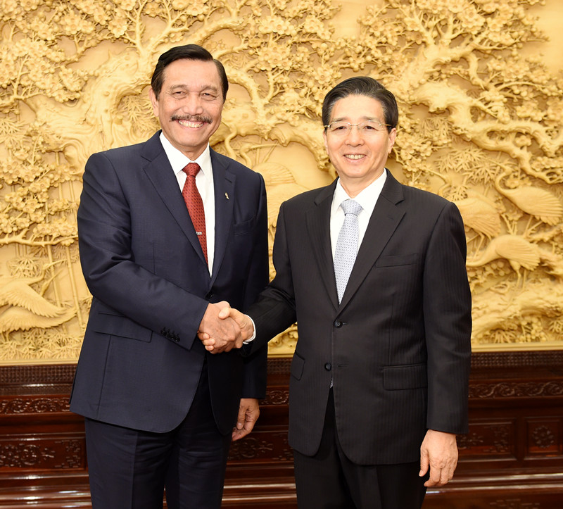 （媒体发稿，共一张）4月13日，中共中央政治局委员、中央政法委书记郭声琨在北京会见印尼总统特使、海洋统筹部长卢胡特。  摄影  郝帆_副本.jpg