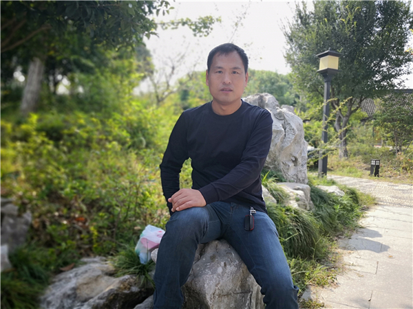 调解为民好榜样_三亚市_李新华生活照2.jpg